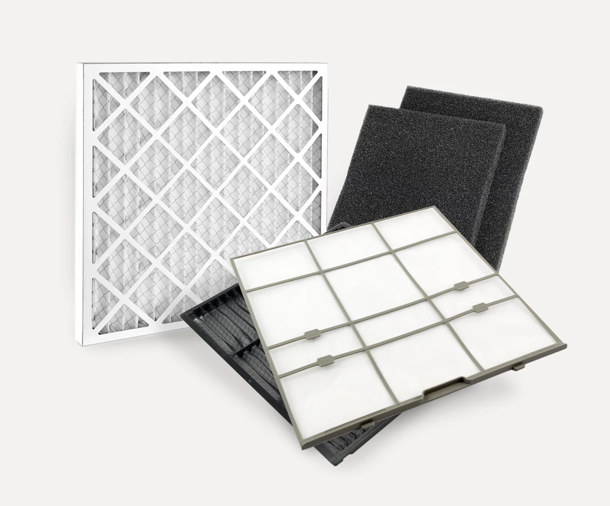 Various types of air filters including a white pleated filter, black foam filters, and a grid filter.